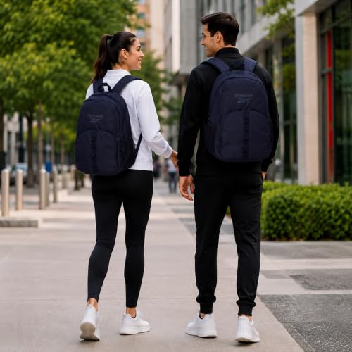 Reebok Travel Backpack Water Resistant Everyday Bag with Laptop Sleeve - color: Santa Fe Navy Blazer