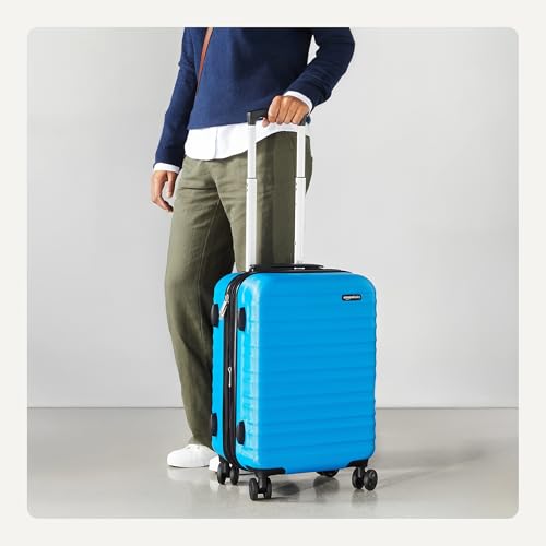 Amazon Basics 21" Hardside Carry-On Luggage with Expandable Space, Scratch-Resistant Surface, Telescoping Handle, Four Multi-directional Wheels, Light Blue - color: Light Blue, size: Carry-On