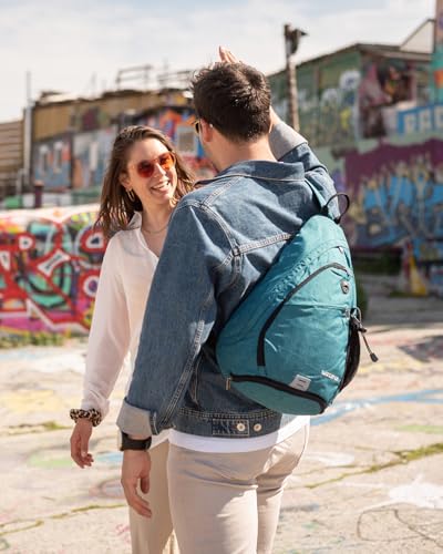WATERFLY Large Sling Bag Crossbody Backpack Chest Pack for Men Women - color: Teal Blue